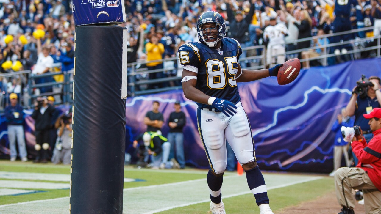 Photo by: Mike Nowak/Los Angeles Chargers San Diego Chargers tight end Antonio Gates smiles after catching a touchdown vs. the New Orleans Saints on Sunday, November 7, 2004 at Qualcomm Stadium in San Diego, California.