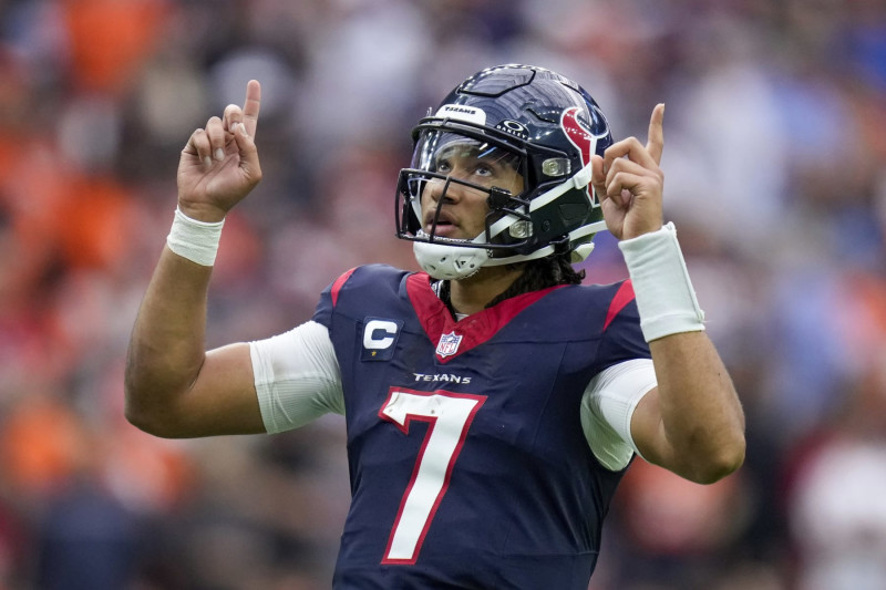CJ Stroud celebrates throwing a touchdown pass. AP Photo/Eric Christian Smith