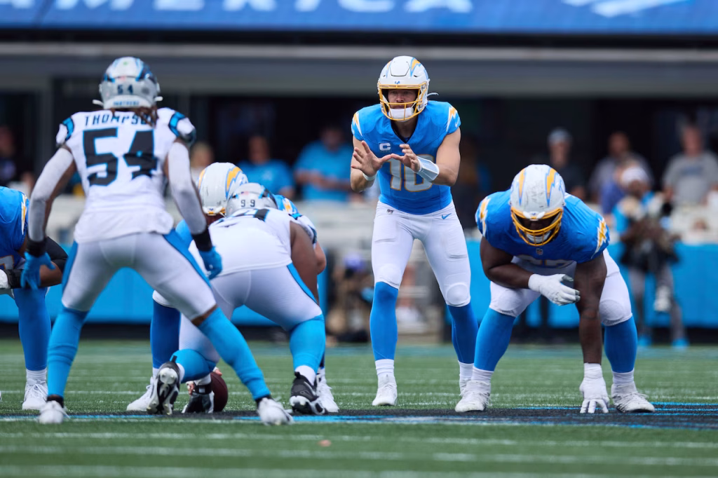 Los Angeles Chargers quarterback Justin Herbert (10) waits for the ball to be snapped during an NFL Football game against the Carolina Panthers, Sunday, Sep. 15, 2024, in Charlotte, N.C. The Chargers defeated the Panthers 26-3. (AP Photo/Brian Westerholt)AP