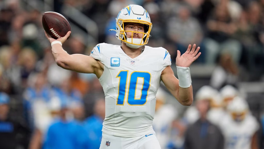 Los Angeles Chargers quarterback Justin Herbert (10) passes against the Las Vegas Raiders during the first half of an NFL football game in Las Vegas, Sunday, Jan. 5, 2025. (AP Photo/Abbie Parr)(AP Photo/Abbie Parr)