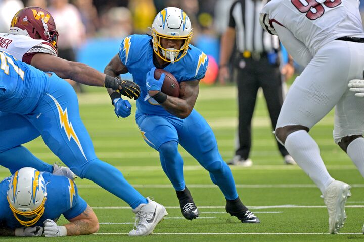 Oct 5, 2025; Inglewood, California, USA; Los Angeles Chargers running back Omarion Hampton (8) carries the ball against the Washington Commanders at SoFi Stadium. Mandatory Credit: Jayne Kamin-Oncea-Imagn