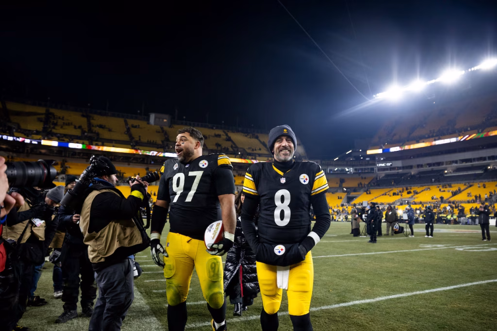 Pittsburgh Steelers quarterback Aaron Rodgers (8) & Pittsburgh Steelers defensive tackle Cameron Heyward (97) during postgame. Pittsburgh Steelers vs. Baltimore Ravens Kylee Surike | Special to PennLiveKylee Surike