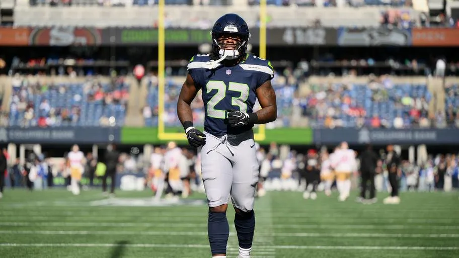 Seattle Seahawks running back Emanuel Wilson (23) warms up before a game against the San Francisco 49ers at Lumen Field. | IMAGN IMAGES